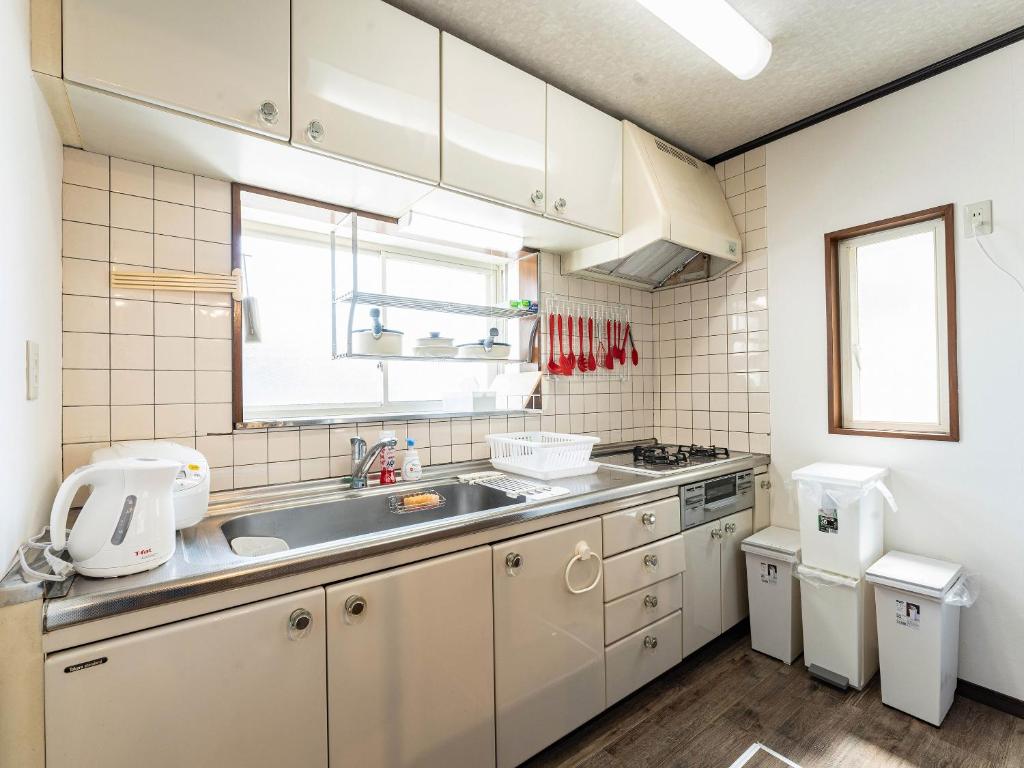 Kuchyň nebo kuchyňský kout v ubytování Ocean villa 大洗