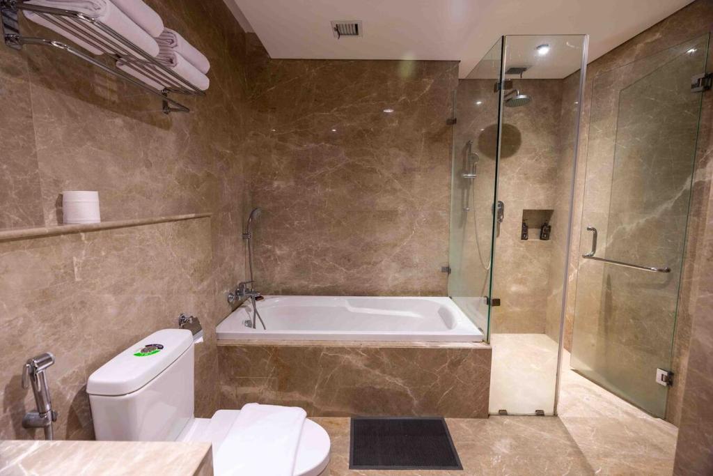 Koupelna v ubytování Azana Suites Hotel Antasari