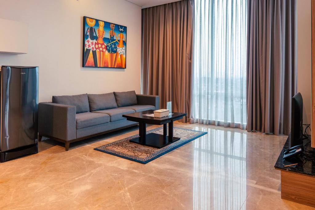 Posezení v ubytování Azana Suites Hotel Antasari