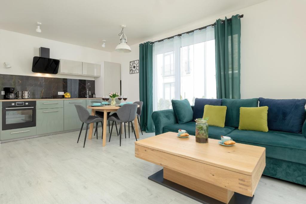 Η κουζίνα ή μικρή κουζίνα στο Apartamenty Paraiso by Noclegi Renters