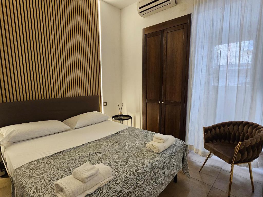 Posteľ alebo postele v izbe v ubytovaní B&B Napoli Centrale Room&Jacuzzi
