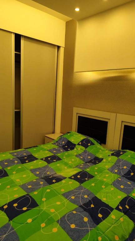 Postel nebo postele na pokoji v ubytování Gentle Breeze Studio 3