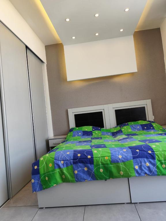 Postel nebo postele na pokoji v ubytování Gentle Breeze Studio 3