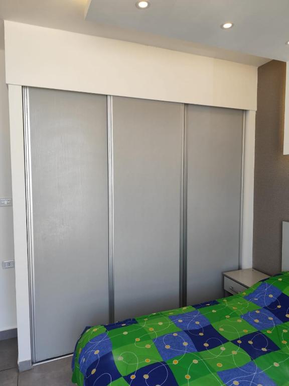 Postel nebo postele na pokoji v ubytování Gentle Breeze Studio 3