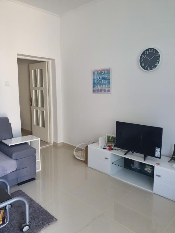 TV a/nebo společenská místnost v ubytování Apartmani Ana i Mia