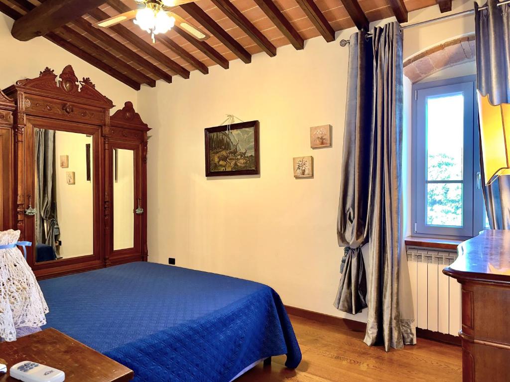 Łóżko lub łóżka w pokoju w obiekcie Relais Santa Margherita