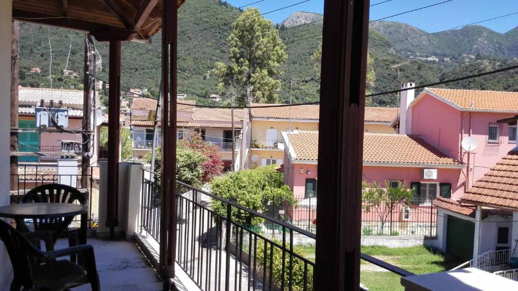 a view from the balcony of a house at Alexa Apartment in Corfu