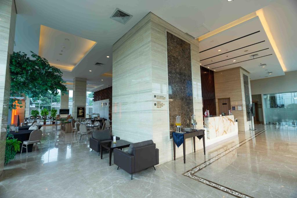 Posezení v ubytování Azana Suites Hotel Antasari