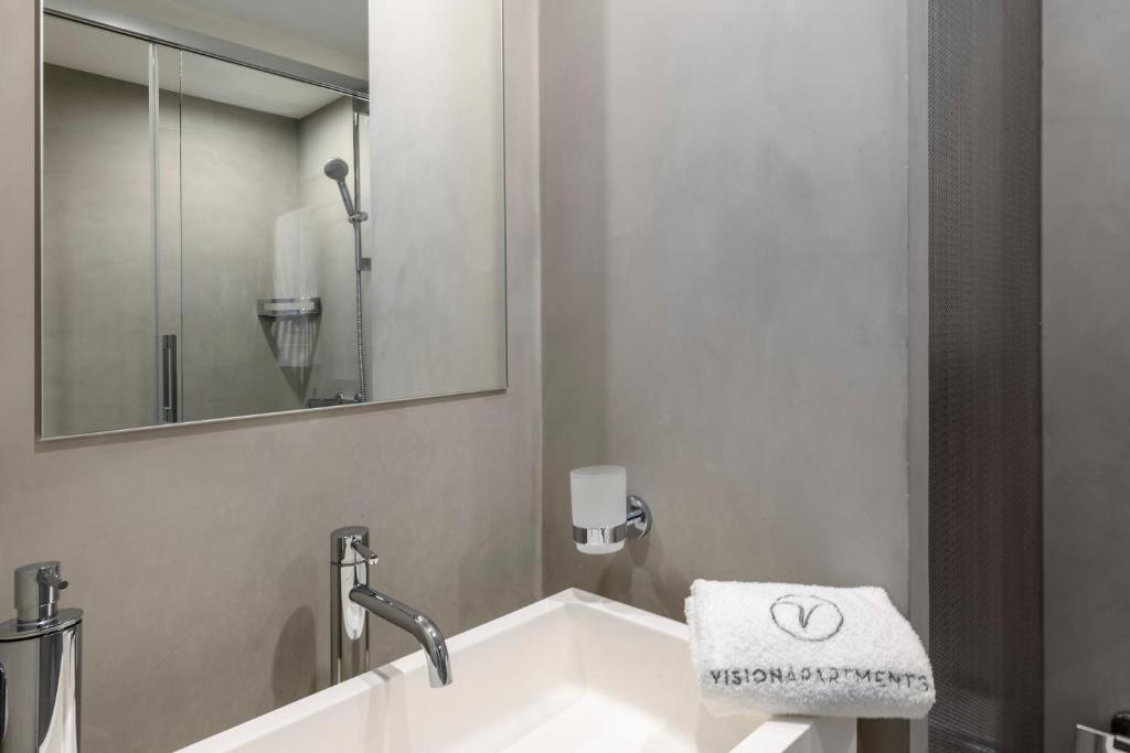 Bilik mandi di VISIONAPARTMENTS Brandschenkestrasse - contactless check-in