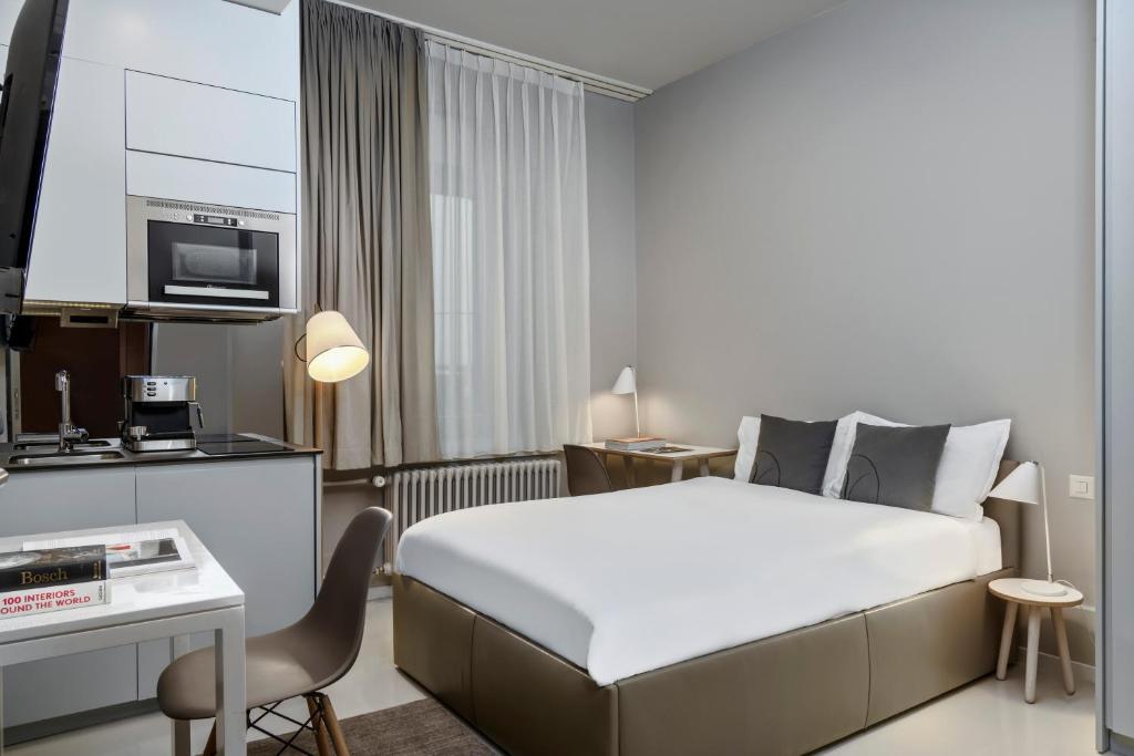 Katil atau katil-katil dalam bilik di VISIONAPARTMENTS Brandschenkestrasse - contactless check-in