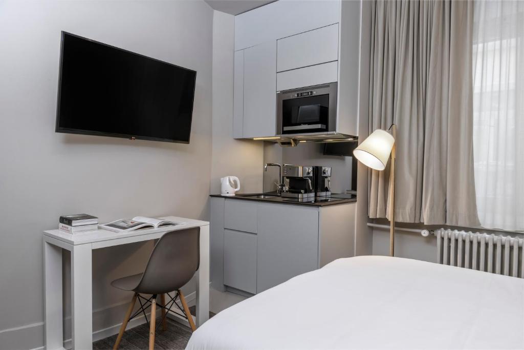 Dapur atau dapur kecil di VISIONAPARTMENTS Brandschenkestrasse - contactless check-in