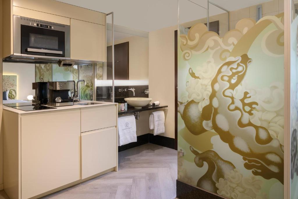 Dapur atau dapur kecil di VISIONAPARTMENTS Brandschenkestrasse - contactless check-in