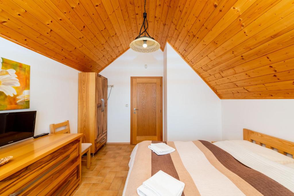 Postel nebo postele na pokoji v ubytování Salaš Vígľaš