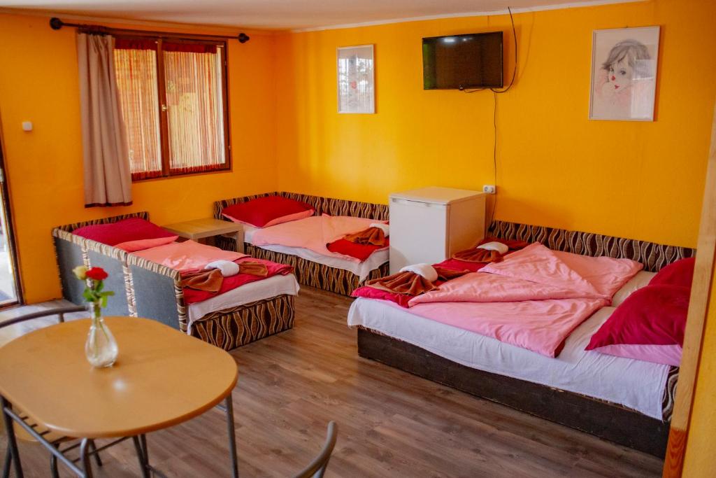 Postel nebo postele na pokoji v ubytování Vakáció Üdülő
