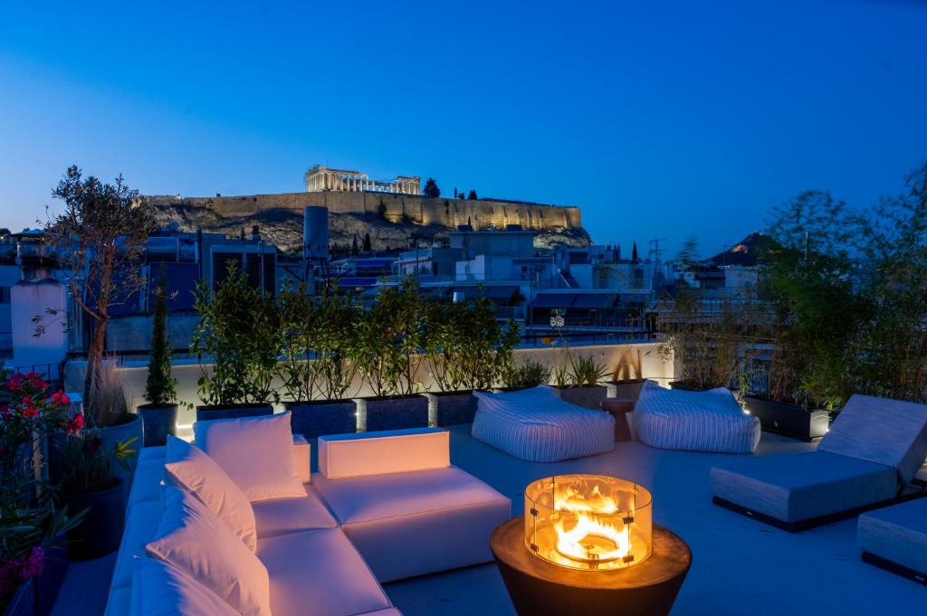 Curated visual reference: Penthouse Apartment Building Rooftop Oasis Reference: 3 Level Acropolis Penthouse With Roof Garden Oasis Athens Updated