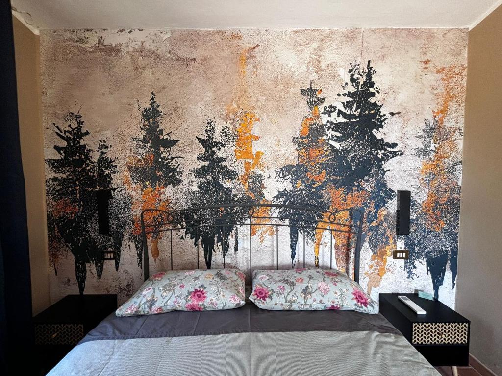 Postel nebo postele na pokoji v ubytování IL Poggio