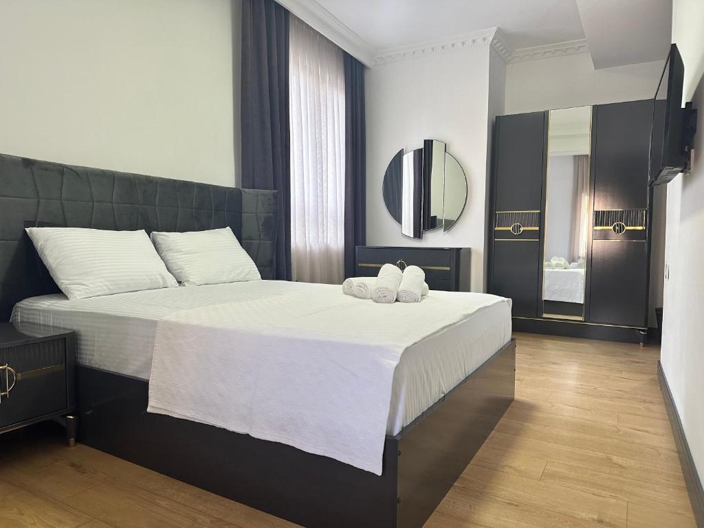 Postel nebo postele na pokoji v ubytování Davidson Boutique Hotel