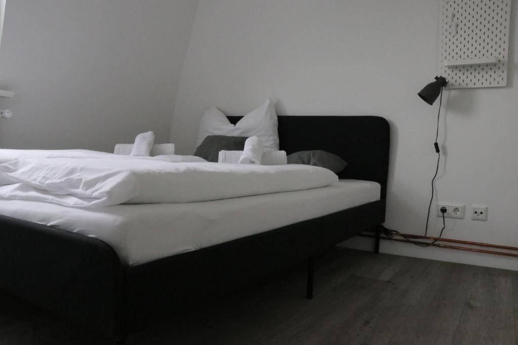 Postel nebo postele na pokoji v ubytování Schlafkonzept Hannover