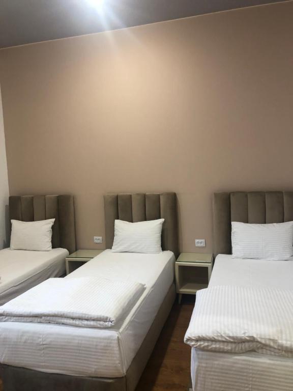 Postel nebo postele na pokoji v ubytování Wald Hotel Lagodekhi