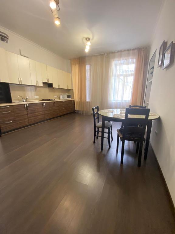 Kuchyň nebo kuchyňský kout v ubytování Afina Aparthotel