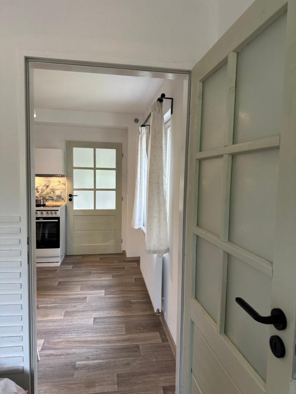 Kuchyň nebo kuchyňský kout v ubytování Apartmány u rybníčka