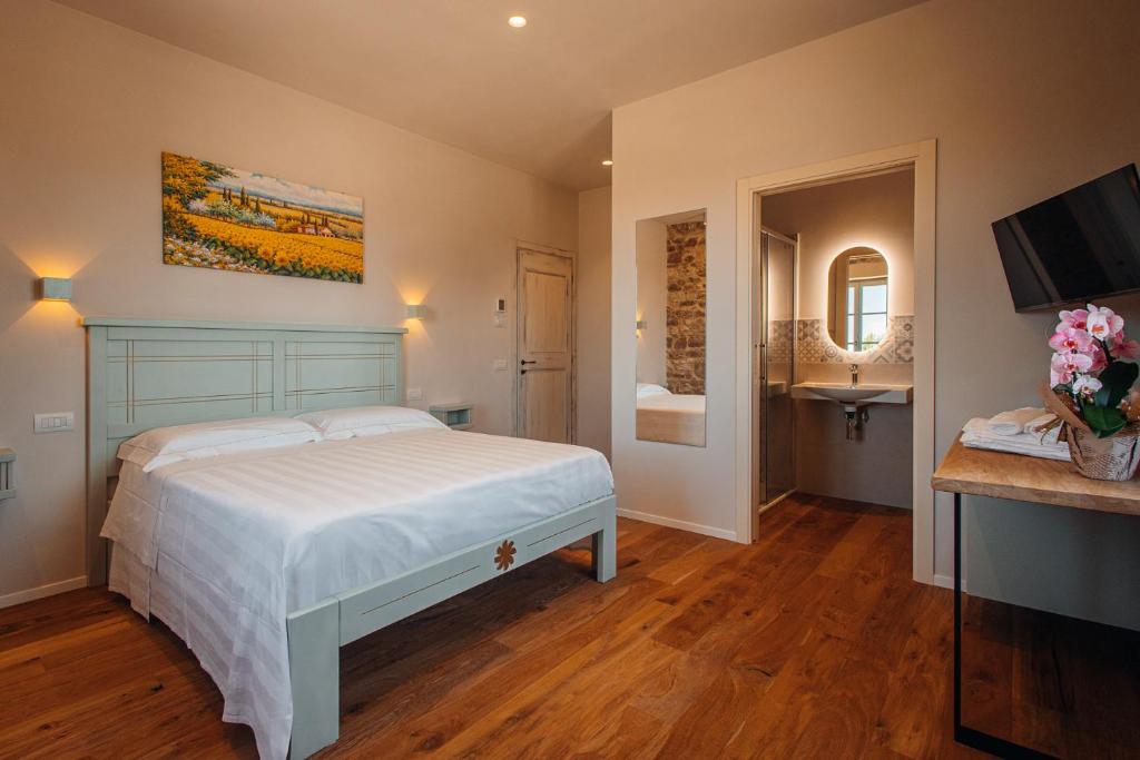 Voodi või voodid majutusasutuse Agriturismo Molinella toas