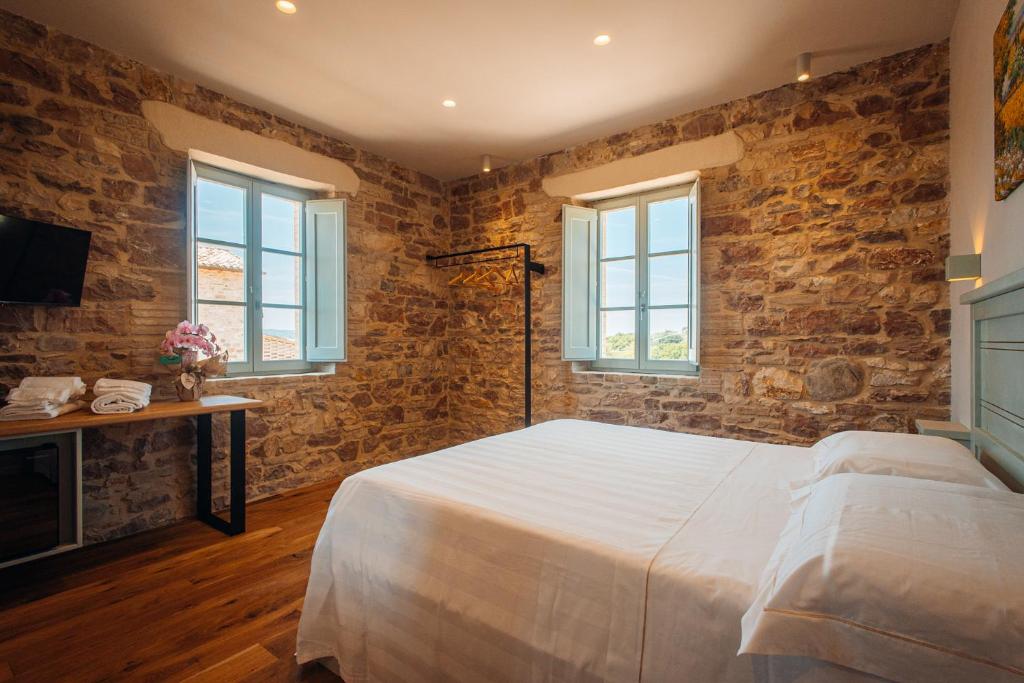 Voodi või voodid majutusasutuse Agriturismo Molinella toas