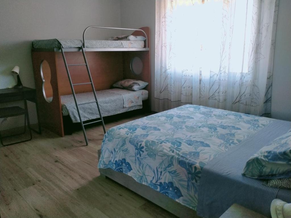 Postel nebo postele na pokoji v ubytování SERENDIPITY B&b