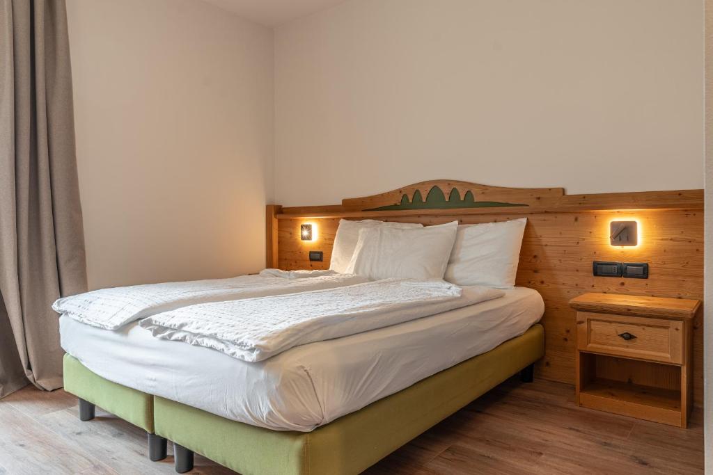 Postel nebo postele na pokoji v ubytování Hotel Ariston