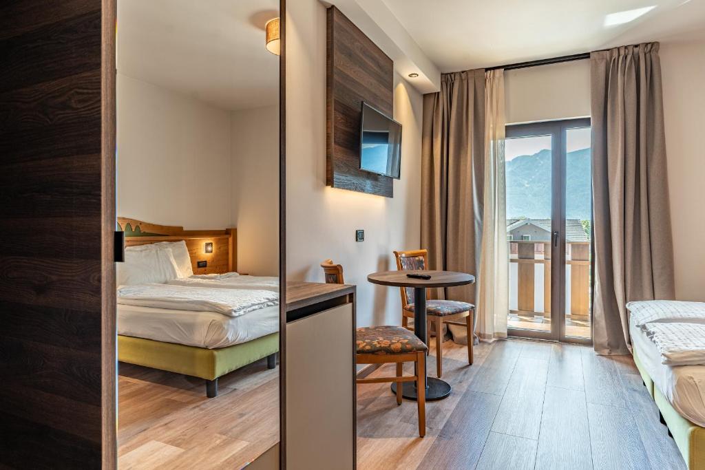 Postel nebo postele na pokoji v ubytování Hotel Ariston