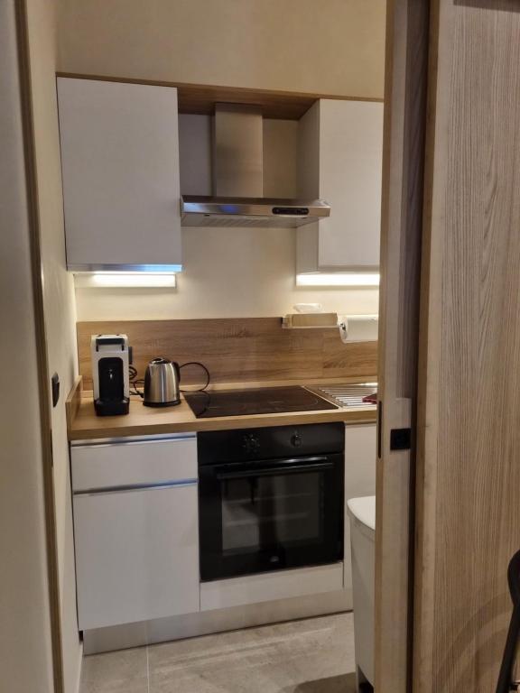 Cucina o angolo cottura di GRAFEA Apartment&Rooms Catania