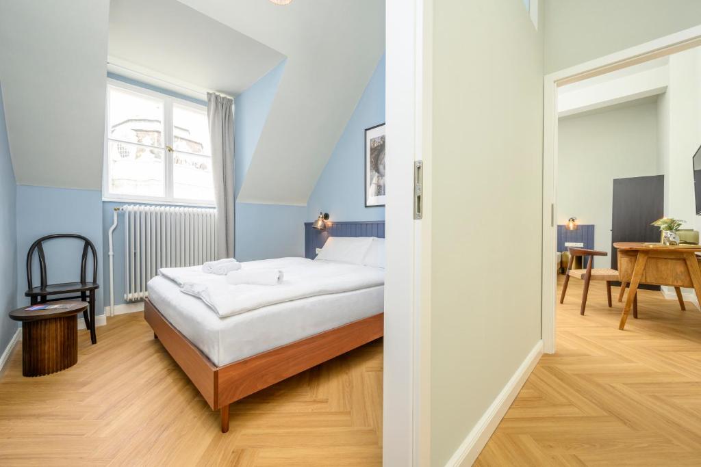 Posteľ alebo postele v izbe v ubytovaní Palais Palffy Suits