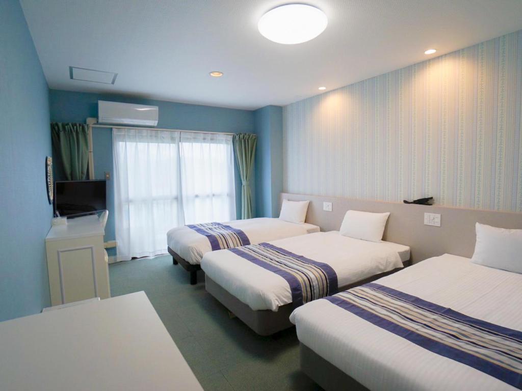 Hotel Caretta - Familienzimmer