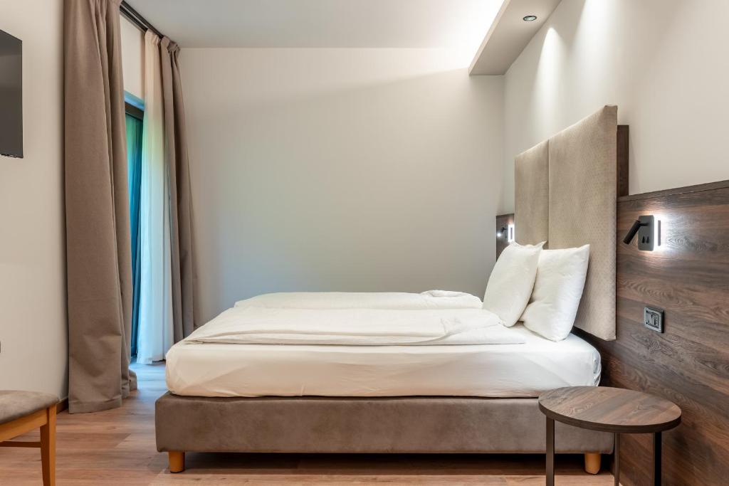 Postel nebo postele na pokoji v ubytování Hotel Ariston