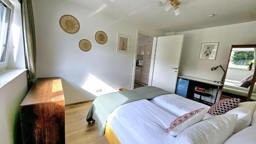Postel nebo postele na pokoji v ubytování "Casa Antonio" 3 Gehminuten Strandbad Sekirn, inkl Seezugang