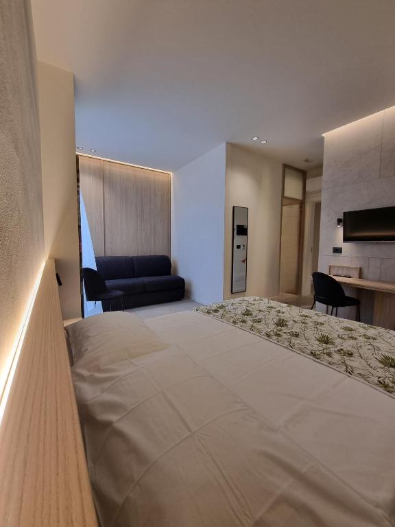 Letto o letti in una camera di GRAFEA Apartment&Rooms Catania