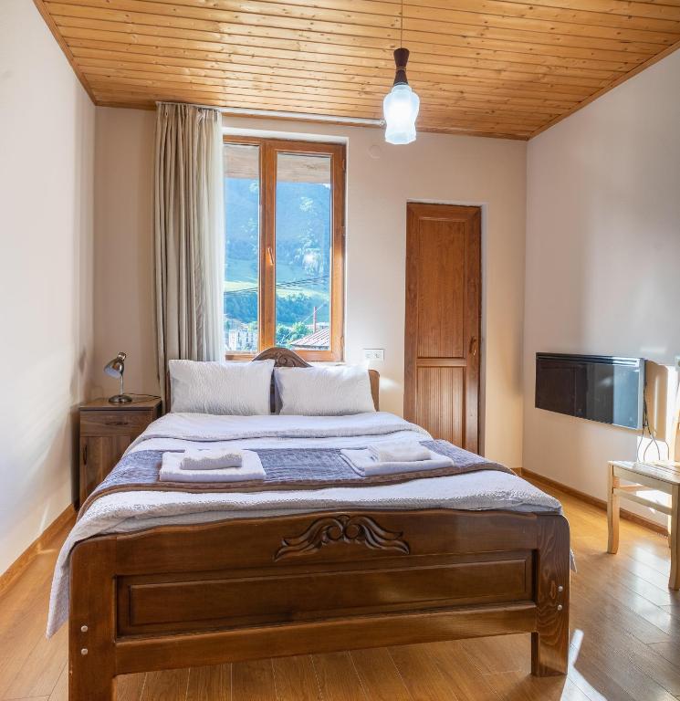 Postel nebo postele na pokoji v ubytování Guest House Nikala