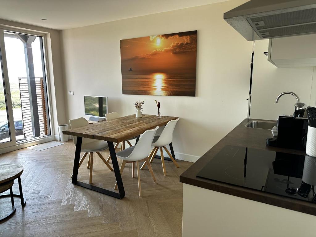 Kuchyň nebo kuchyňský kout v ubytování Dunefront Apartment