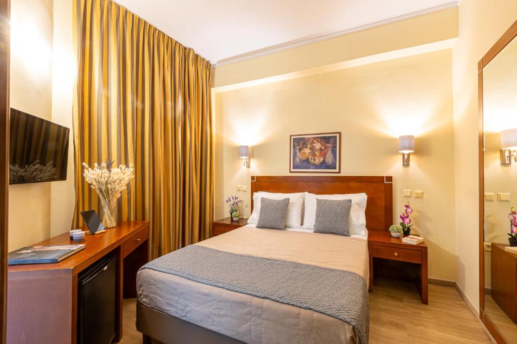 Postel nebo postele na pokoji v ubytování Hotel Marina