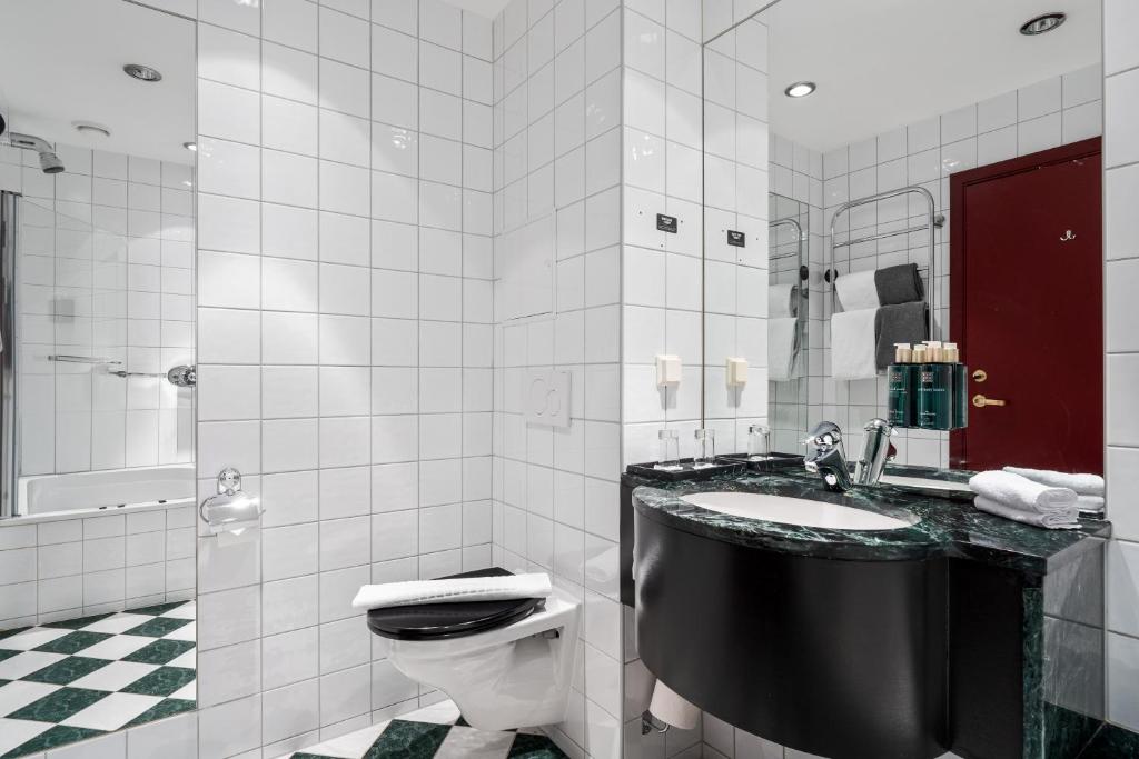 Koupelna v ubytování Home Hotel Bryggen