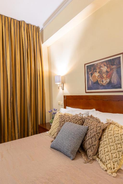 Postel nebo postele na pokoji v ubytování Hotel Marina