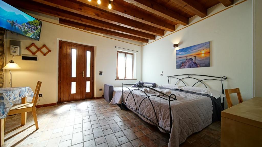Postel nebo postele na pokoji v ubytování B&B Relax Rooms - Peschiera del Garda