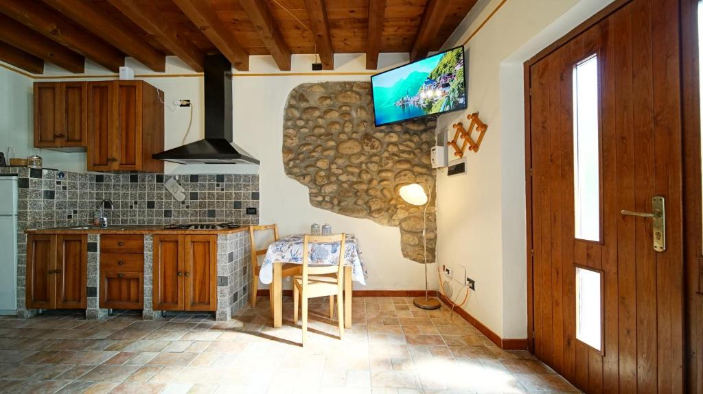 TV a/nebo společenská místnost v ubytování B&B Relax Rooms - Peschiera del Garda