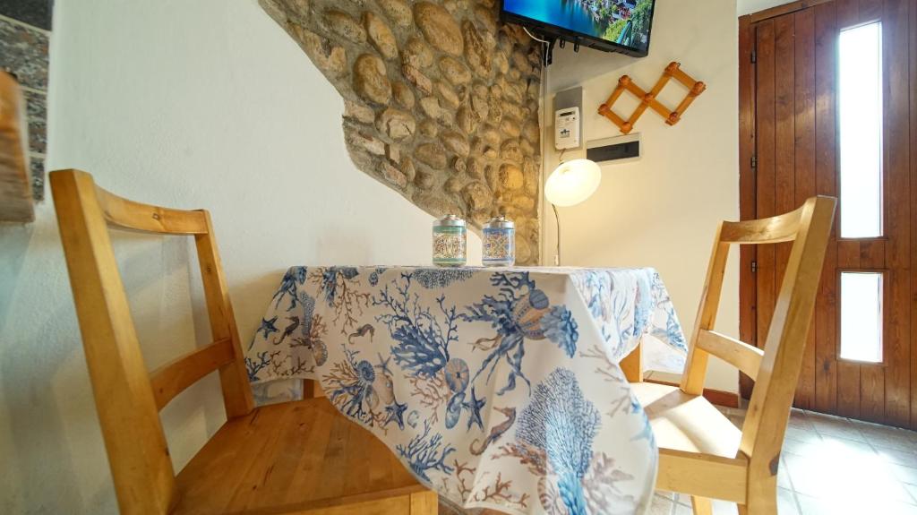 TV a/nebo společenská místnost v ubytování B&B Relax Rooms - Peschiera del Garda