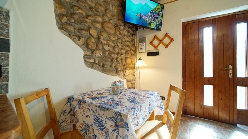 TV a/nebo společenská místnost v ubytování B&B Relax Rooms - Peschiera del Garda