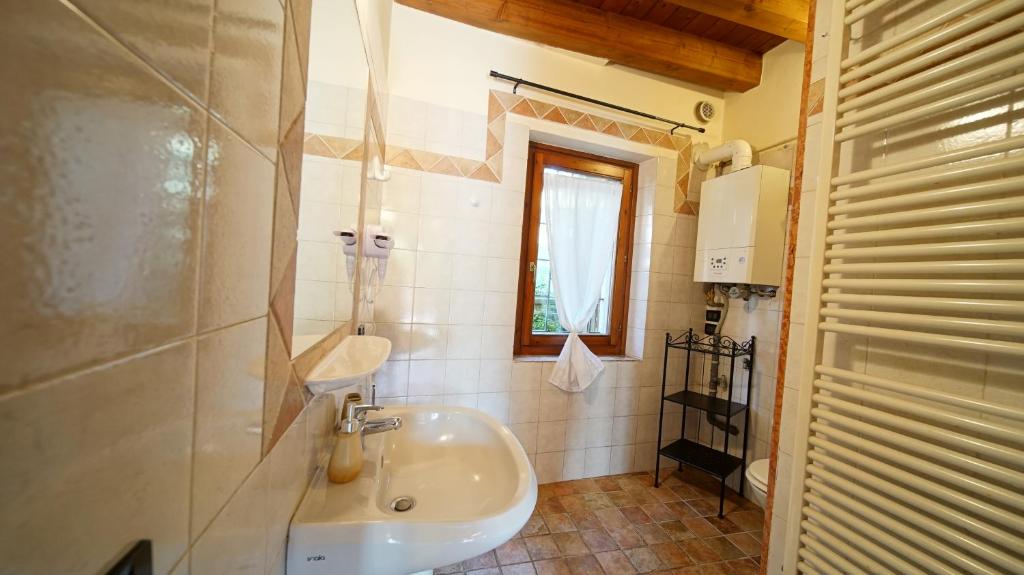 Koupelna v ubytování B&B Relax Rooms - Peschiera del Garda