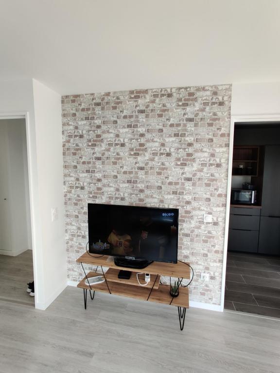 Photo de la galerie de l'établissement Appartement neuf près de la Défense Arena, à Nanterre