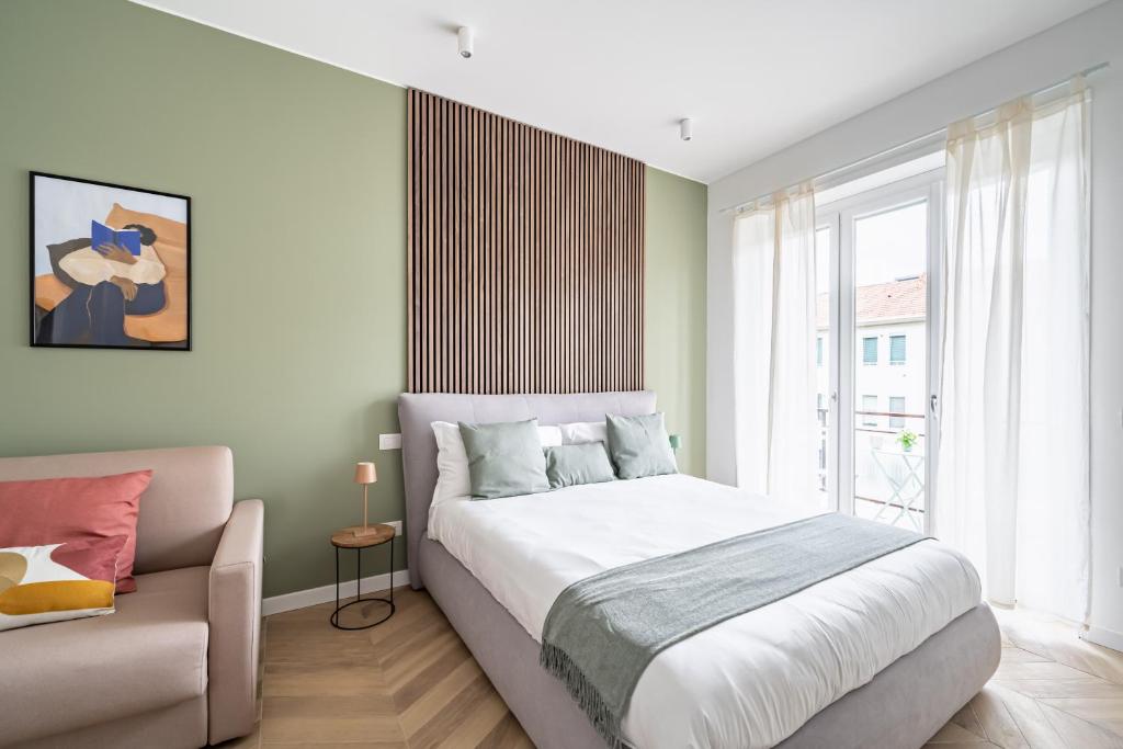 Postel nebo postele na pokoji v ubytování Milanofierapartments Colonna