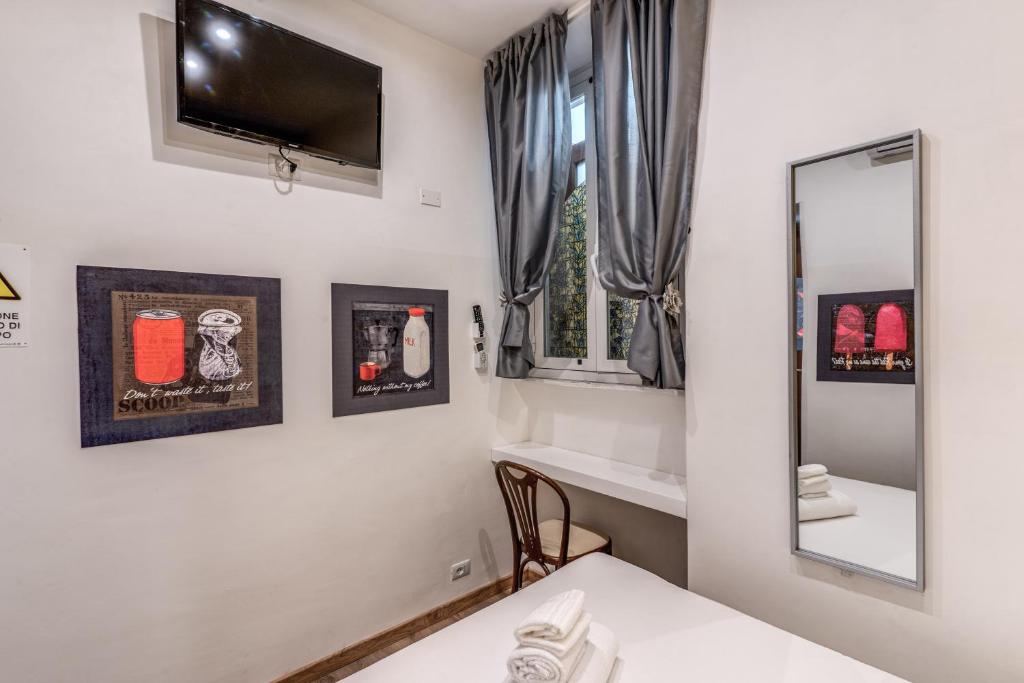 Postel nebo postele na pokoji v ubytování Hotel Santa Prassede