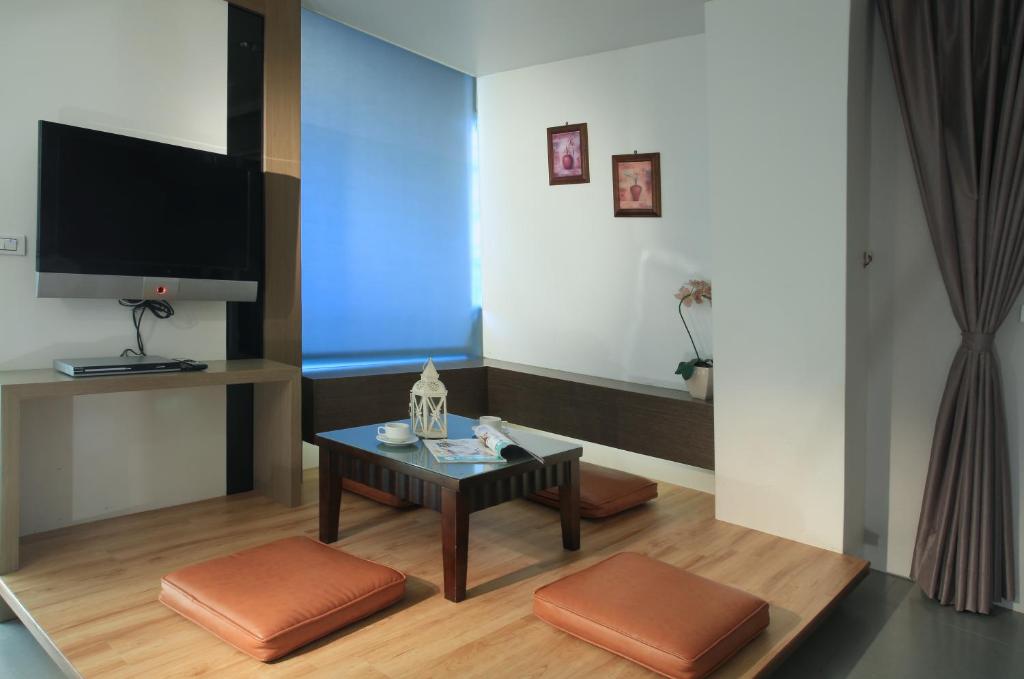 TV a/nebo společenská místnost v ubytování Spring Fountain Hotel
